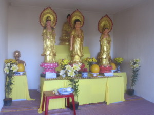 The Buddhist shrine built inside the house to quiet the ghosts.